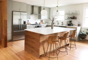 Modern kitchen remodel with Walnut kitchen island and painted cabinets