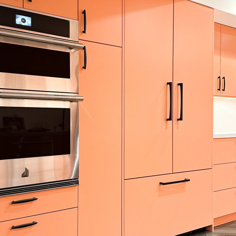 Paint-Ready Slab kitchen cabinet doors painted in pink