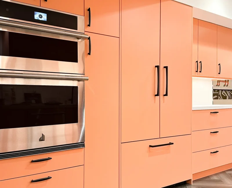 Paint-Ready Slab kitchen cabinet doors painted in pink